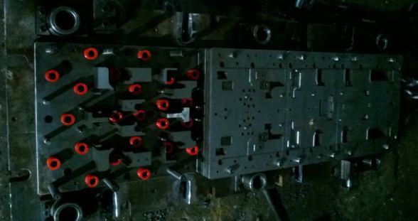 Press tool — spring-loaded die