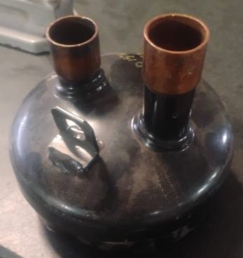 Vessel assembly with copper nozzles
