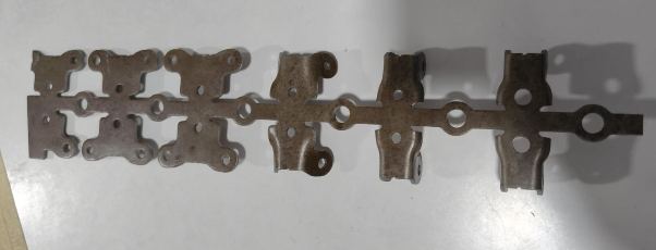 Progressive strip — formed carrier