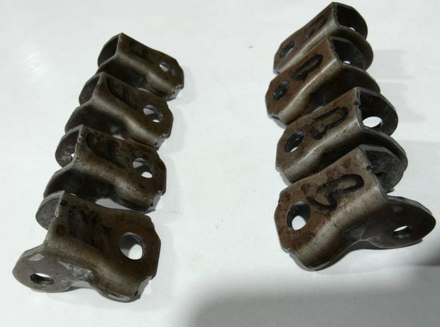 Formed brackets off progressive tool