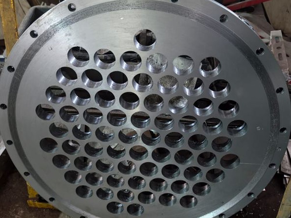Precision-machined and drilled steel plate